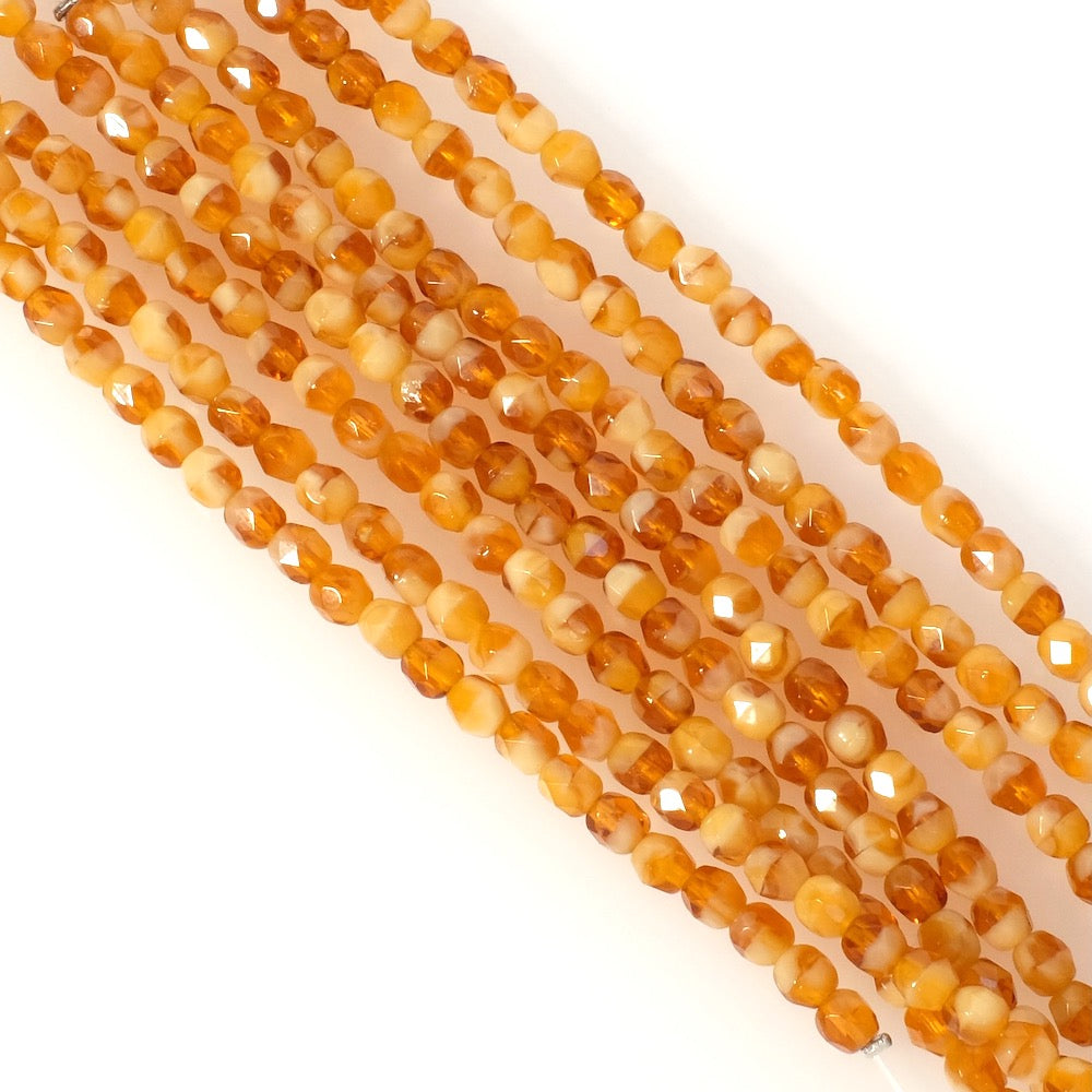 Fil de perles de Bohème rondes facettées 4mm orange miel