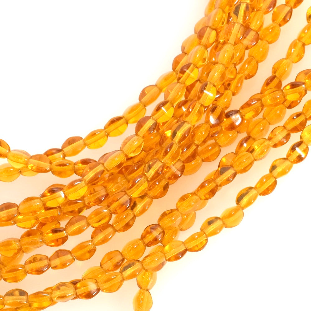 Boheemse pareldraad Facet Olijven 5mm transparant amber